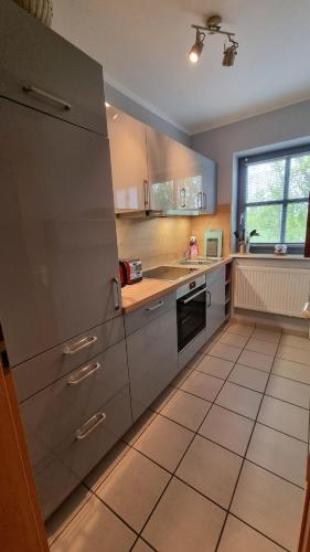 Surforama Ferienwohnung Fehmarn mit Garten in Neujellingsdorf