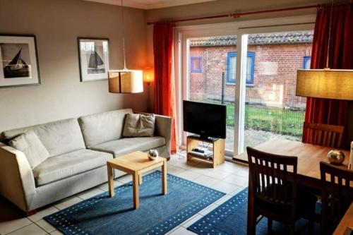 Surforama Ferienwohnung Fehmarn mit Terrasse - barrierefrei in Neujellingsdorf