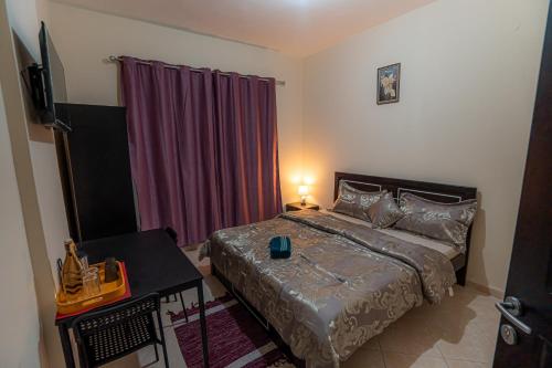 Baith al jannah hotel apartment LLC near Universal Speciality Medical Center