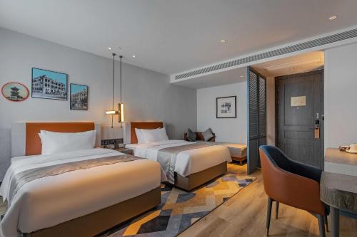 Superior Twin Room room in Wuhan Jiangtan Haobainian Meilun International Hotel
