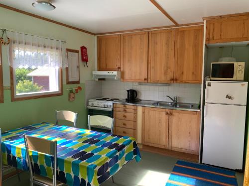 Lappalaisen lomamökit Marjamaja - Location, gîte - Viljakansaari