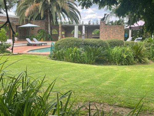 Footprints Self Catering Indoor Heated Pool and Fireplaces in Lanseria