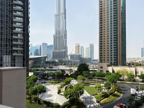 High-Rise Apartment by Burj and Fountain - image 5
