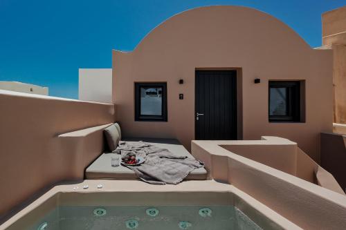 AKRI santorini with heated jacuzzi in 安普雷奧