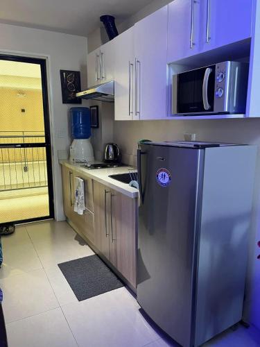 Isidro's Crib at Matina Enclaves Residences with a strong wifi and netflix near Davao Baywalk (Seawalk)