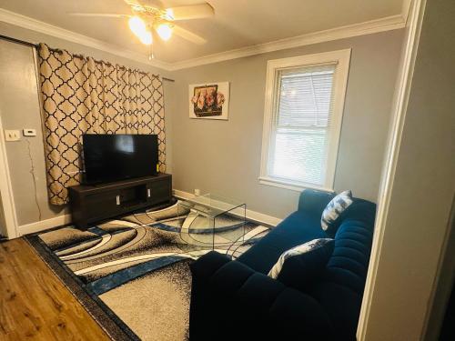 Shared lounge/TV area, Cozy in Hyde Park Greater Grand Crossing in Woodlawn