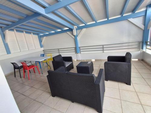 Μπαλκόνι/βεράντα, Ti Nid caraïbe (Ti Nid caraibe) in Καπεστέρ-Μπελ-Ο