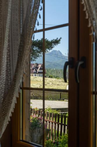 TATRA COTTAGE goralski domek z kominkiem – khách sạn tại Murzasichle