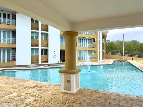 Oceanview Costa del Mar Condo with Pool and Smart TV - image 6