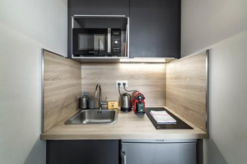 AllinLyon | Studio vue toits Presqu’île, Lyon (photo 6)