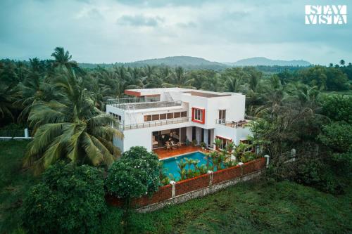 Exterior view of StayVista at Azure Bliss with Huge Pool, BBQ, Wi-Fi