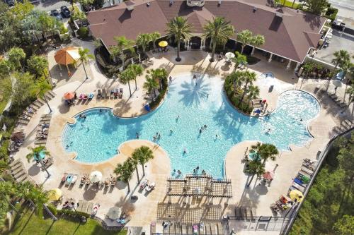 3 miles to Disney water park kids disney rooms pool table air hockey private pool and spa
