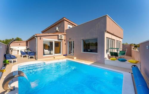 Lovely Home In Peroj With Sauna