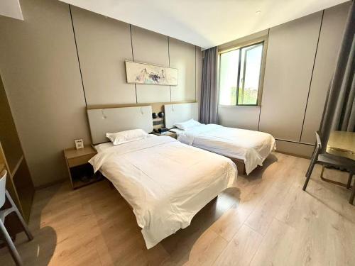 Jitai Boutique Hotel - Central District Bailian Qilian Mountain South Road Metro Station Branch