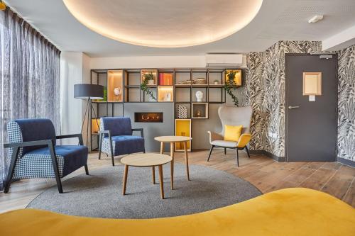 ล็อบบี้, อพาร์ตโฮเต็ล โอดาลีส์ ซิตี้ - นีมส์ อาเรนส์ - ปาแล เดส์ กงเกร (Appart'hôtel Odalys City - Nîmes Arènes - Palais des Congrès ) in นีเมอ