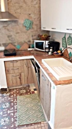 virtuve, Nicola appartamento in Giba