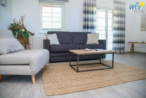 Ferienhaus am Gutspark Drankse Ferienwohnung Sonnentag in Dranske, Deutschland