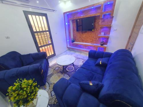 gedeelde lounge/tv-ruimte, Alouche in Grand Dakar