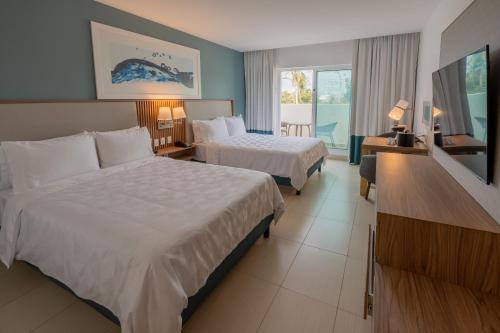 Standard Queen Room with Two Queen Beds and Balcony image 4