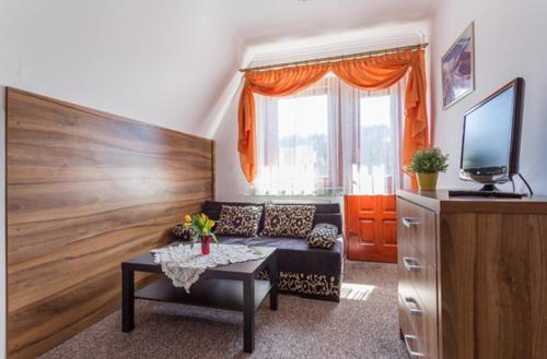 Apartamenty i Pokoje Gościnne DZIEDZIC Józef – Poronin, IA