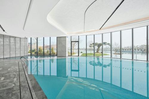Swimming pool, JW Marriott Hotel Shanghai Fengxian in Fengxian and Jinshan Resort