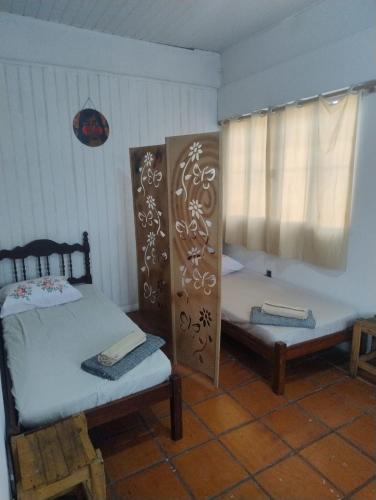Single Bed in Dormitory Room room in A Casa Jambu Mineiro