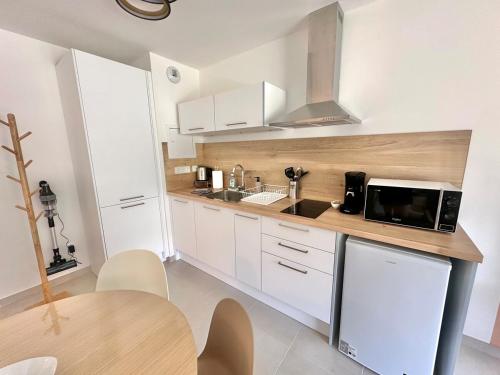 베르크 Chérima - Bel appart au RDC avec Terrasse et Parking à Berck-Plage (Cherima - Bel appart au RDC avec Terrasse et Parking a Berck-Plage) 4성급 싱글룸 레스토랑