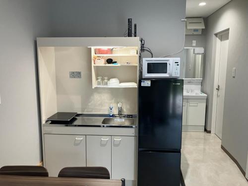 Sapporo Station vicinity, Naebo Station 5 minutes, sleeps up to 6, 2 minutes to the hot spring, plenty of parking