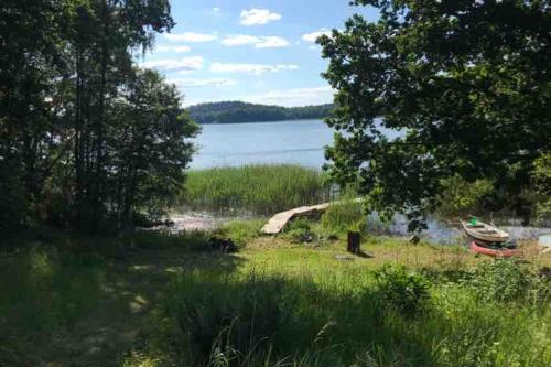 Cabin in the forest by the lake in Marsta Södra
