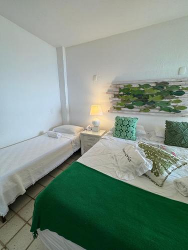 Standard Triple Room with Sea View image 1