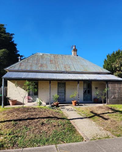 Buitenkant, Eileen's Cottage in Lawson