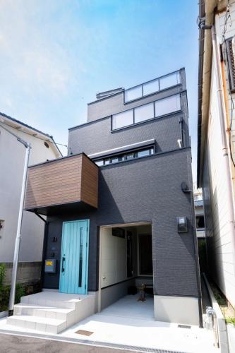 숙소 외관, Town House Suma in 수마