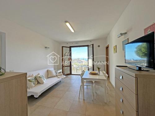 One-Bedroom Apartment room in 228 - Appartamento bilocale al primo piano con terrazzo vista mare- CLIMATIZZATO SPIAGGIA E NAVETTA PRIVATA INCLUSA AL WHTE BE