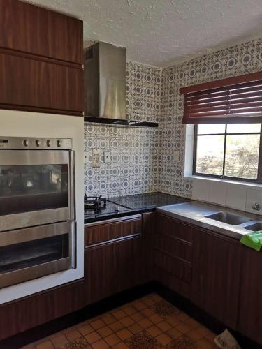 Kitchen, Cozy 3 安逸舒适小屋 in Mairehau