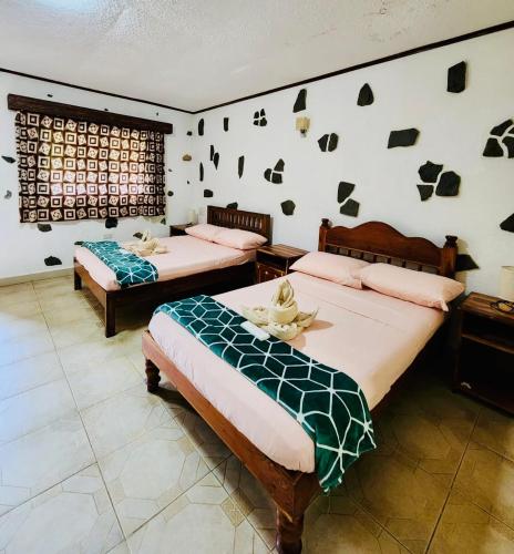 TipTop Hotel, Resto and Delishop Room Type - Quadruple Room with Balcony