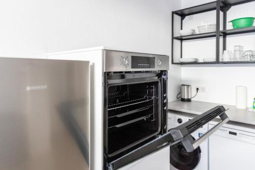 Apartment mit vier Einzelboxspringbetten - Netflix in กอช