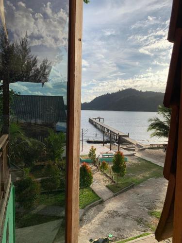 Voltants, Ricky's Beach House in Sigunturmuda