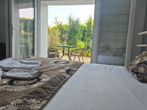 ระเบียง/ชานเรือน, Chambre double avec salle de bain privative in ฮอนเดย