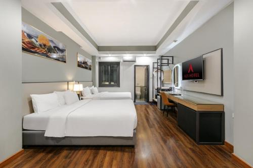 A25 Premium Hotel - 12 Phố Huế - Tap to explore photos