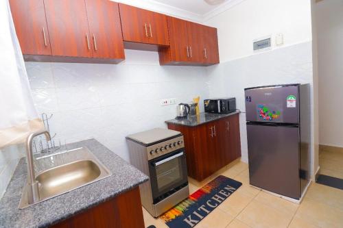 keittiö, Modern 3BR Apartment near JKIA and SGR with Free Parking in Athi River