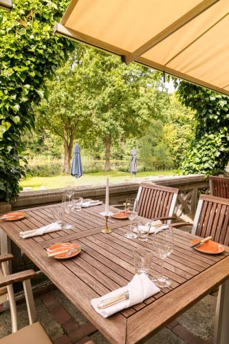 Erkély/terasz, Hotel Waldesruh Am See in Aumuhle