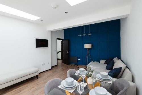 Shared lounge/TV area, Two Bedroom Executive Pad by Traboule Properties Ltd in Warrington