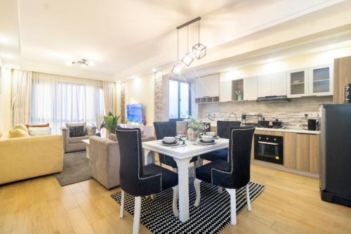 Serene stays apartment with amazing city views, heated swimming pool, modern equipped gym, private parking space and child play area