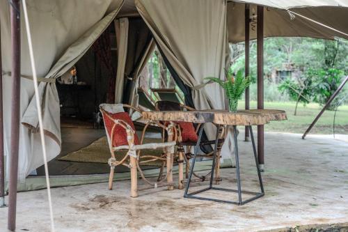 Dolly Farm & River Camp, Luxury Tents - Tap to explore photos