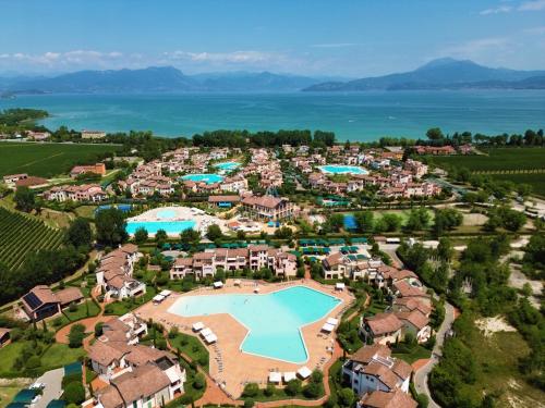 A szálláshely kívülről, Resort Apartment - Borgo esclusivo con Piscine e Campi sportivi in Bassana