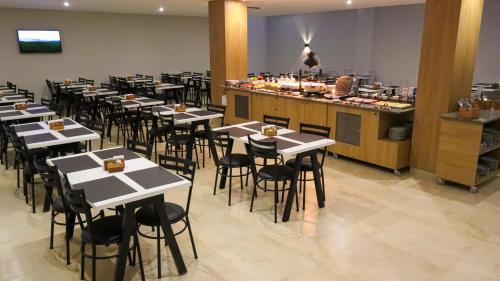 Restorāns, Hotel Greenville by Slim Hotéis (Hotel Greenville by Slim Hoteis) in Primavera Do Leste