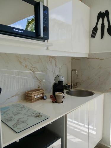 Cozinha, Au Nid de KLOE, plage & piscine in Grand-Bourg