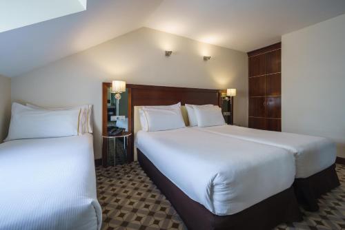 Double Room with Extra Bed room in Eurostars Gran Via