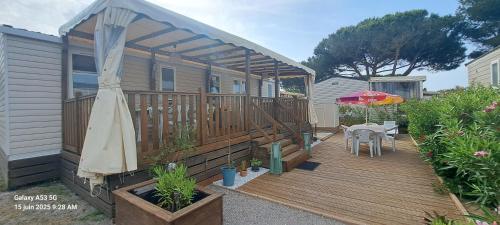 Mobil home neuf 40 m2 - 2 chambres - 100 m plage et belle vue sur la lagune et les Pyrénées