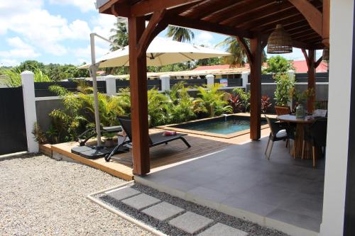Удобства, Kaza Kigélia - Villa avec piscine privative - Proche de Tout (Kaza Kigelia - Villa avec piscine privative - Proche de Tout) in Grand-Bourg